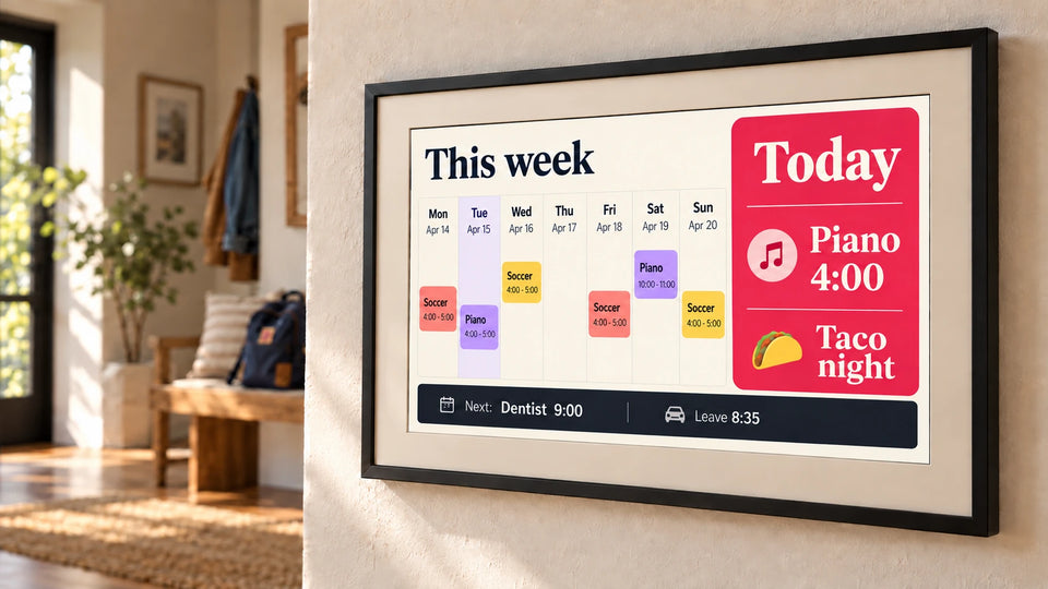 A photo frame by a front door showing this week's family calendar, a piano lesson and taco night