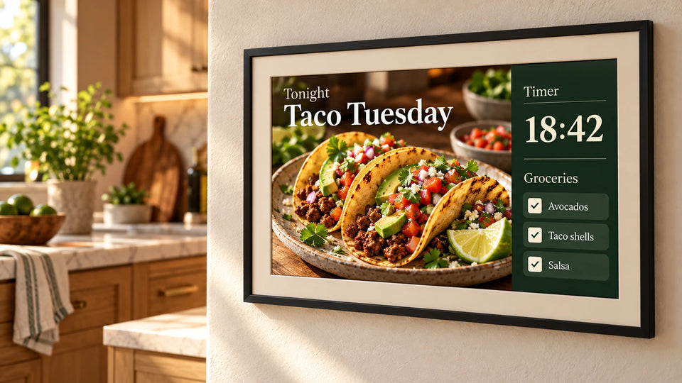A photo frame in a kitchen showing Taco Tuesday, a cooking timer and the grocery list