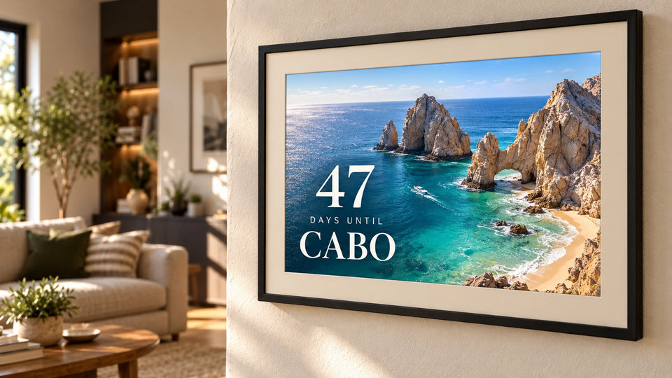 A photo frame showing 47 days until a trip to Cabo over a beach photo